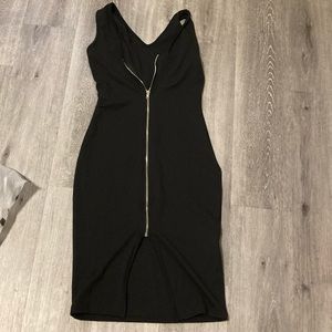 Black dress with zipper detail in front. New.